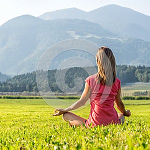 Woman Meditate at the Mountains