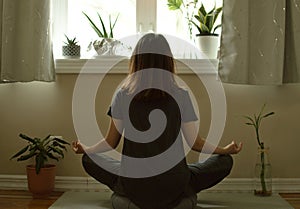 Woman Meditating at Home on Meditation Pillow Mat Healthy Lifestyles