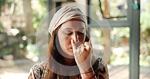 Woman, meditation and breathing nostril for exercise or holistic ritual for spiritual or natural healing in sacred place