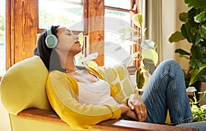 Woman, meditation and headphones, listen to music or podcast for peace and stress relief, sleeping and relax at home