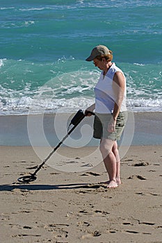 Woman with Metal Detector