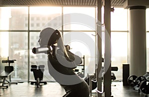 Woman of middle age working out in gym photo