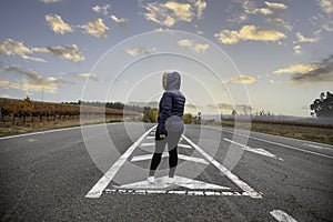 Woman in the middle of the road