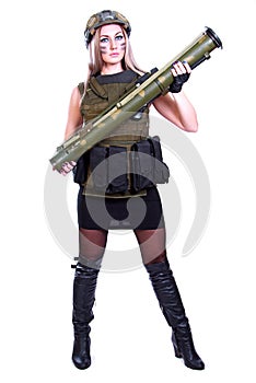 Woman in a military camouflage with a bazooka