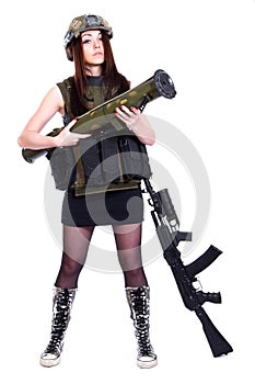 Woman in a military camouflage with a grenade launcher and an as