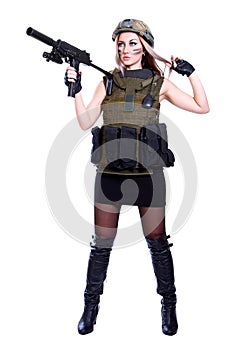 Woman in a military camouflage holding the smg photo