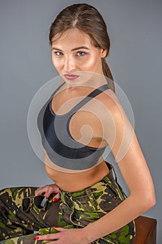 woman in military uniform camouflage sports