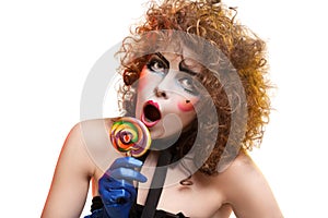 Woman mime with theatrical makeup singing