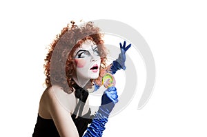 Woman mime with theatrical makeup. Studio shot.