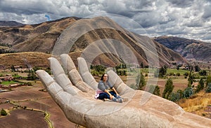 A woman at the Mirador de Cielo Punku viewpoint in Huaro, Cusco, Peru. photo