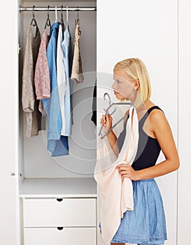 Woman, mirror or choosing clothes in closet for morning routine, fashion or clothing in bedroom of home. Person, outfit