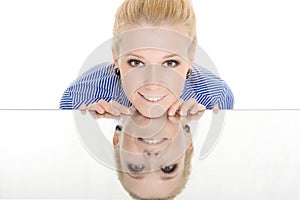 Woman mirror smile on white background photo
