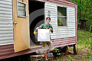 Woman at a Mobile Home