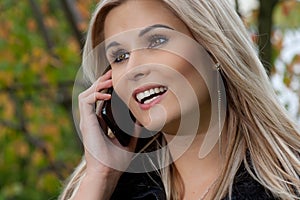 Woman with mobile telephone