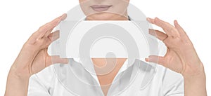 Woman with a mockup in her hand on a white background isolate