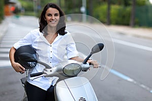 Woman on a moped