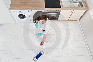 Woman Mopping Floor