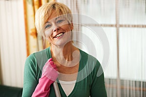 Woman mopping the floor in her home