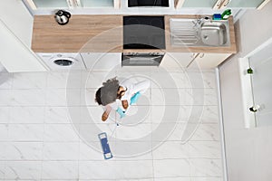 Woman Mopping Floor