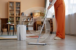 Woman Mopping Floors During Spring Cleaning