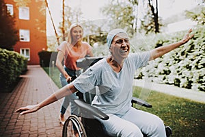 Woman with Mother. Cancer. Having Fun. Clinic.