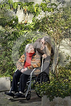 Woman with Mother in Garden - Vertical