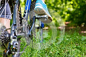 Woman on mountain bike closeup