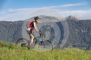 Woman on mountain bike in the German Alps
