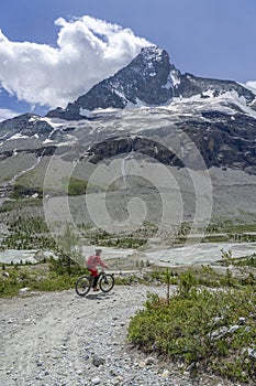 Woman on mountain bike in Zermatt, Switzerland