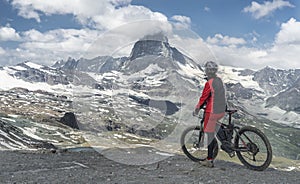 Woman on mountain bike in Zermatt, Switzerland