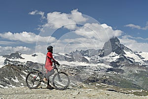 Woman on mountain bike in Zermatt, Switzerland