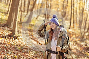 Woman mountaineering on a sunny autumn day