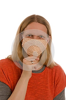 Woman with mouth protection and mask