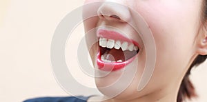 Woman mouth smile with great teeth on background.