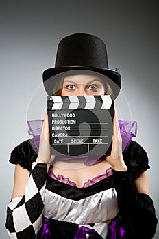 Woman with movie clapboard