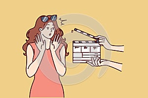 Woman movie star is embarrassed sees clapboard passing casting call for role in popular series