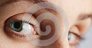Woman, moving eyes or eye vision macro against a gray studio background. Thinking, contemplating or thoughtful girl with