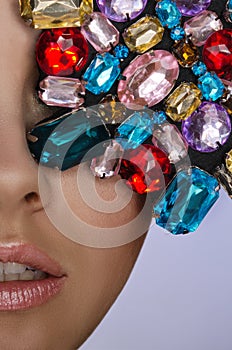 Woman with multicolored stones