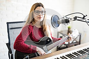 Woman music artist broadcasting a podcast episode