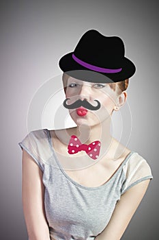 Woman with mustache in a hat