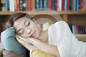 Woman napping on couch photo