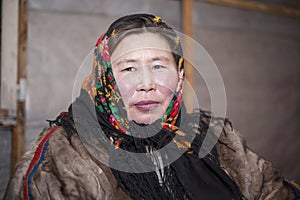 Woman in the national winter clothes of the northern inhabitants of the tundra, the Arctic circle