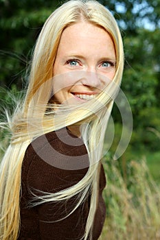 Woman in Nature with Blowing Hair