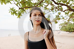 woman nature sand ocean young sea vacation tropical smile beach summer