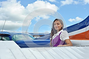 Woman near airplane