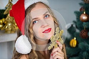 Woman near x-mas tree