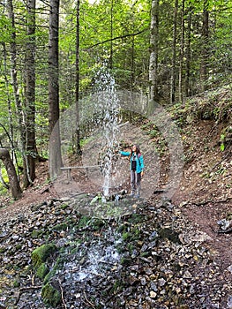 Woman near mountain gazer