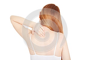 Woman with neck pain, back view, clipping path