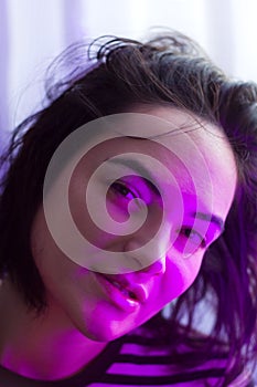 woman in neon lights, female trendy studio portrait