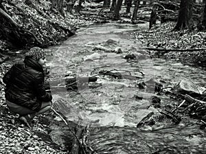 Woman next to Forest Brook